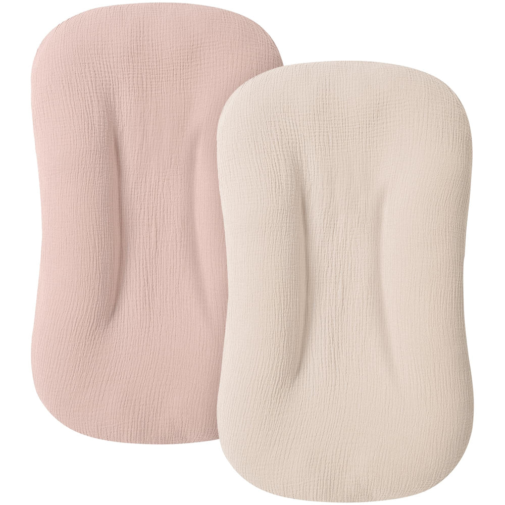 MairMore muslin baby lounger cover in pink close-up highlighting soft breathable cotton for newborn comfort.