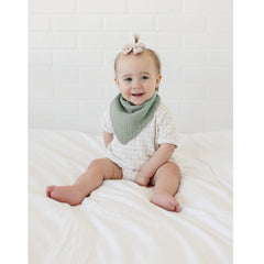 MairMore muslin bib used as drool catcher highlights versatile, multi-use design.