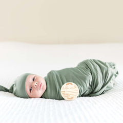 MairMore swaddle 47x47 inches demonstrates generous wrap for cozy newborn comfort.