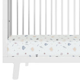 Makemake Organics Mighty Heros crib sheet folded, showcasing soft organic cotton