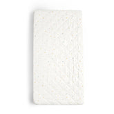 Makemake Organics Dotty changing pad closed showing compact portable design for on-the-go diaper changes