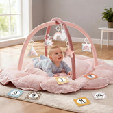 Mallify 5-in-1 baby gym pink ball-pit with plush surface supports tummy time.