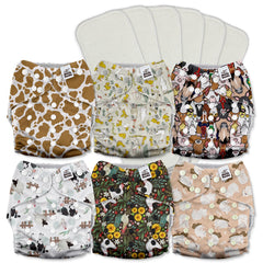 Mama Koala 3.0 cloth diaper outer with crossover snaps for secure fit and leak prevention.