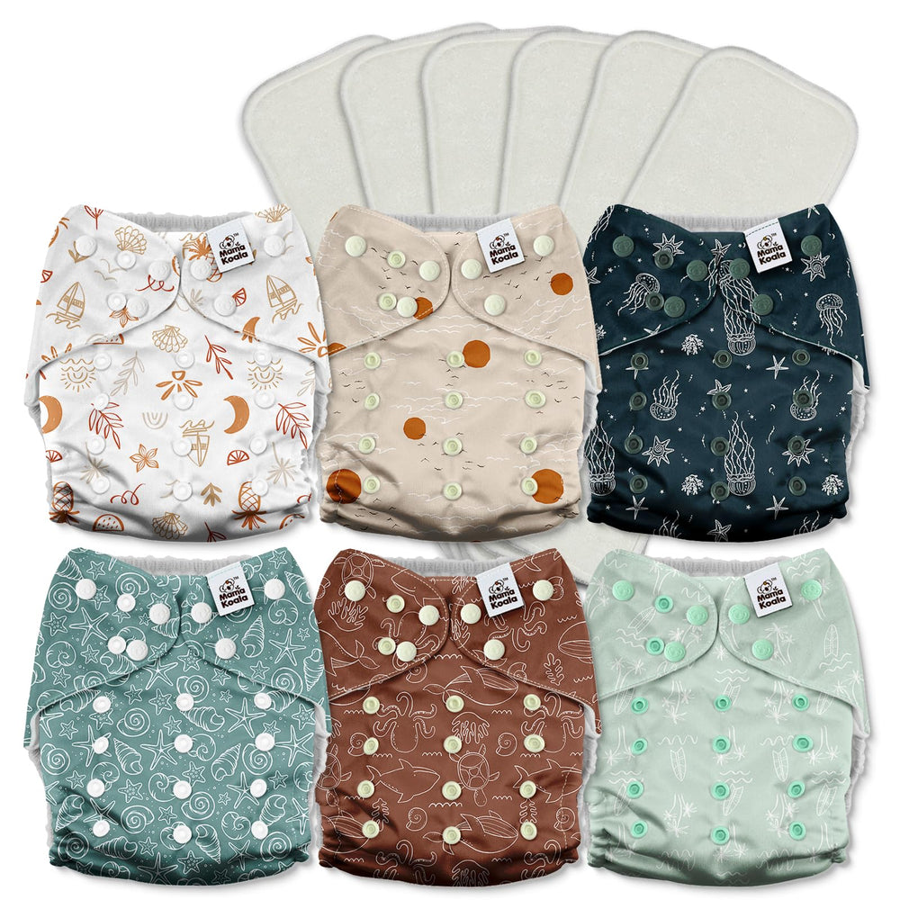 Mama Koala 3.0 diaper with crossover snaps for secure fit and leak prevention.