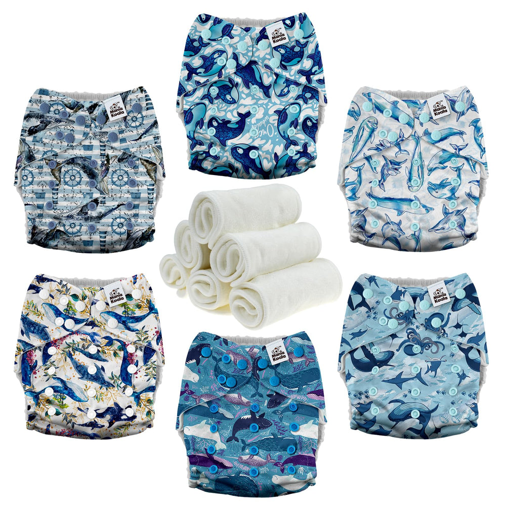 Mama Koala 3.0 pocket diaper cover in whales print shows secure fit and leak protection