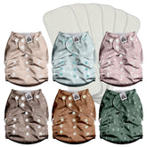 Mama Koala 3.0 pocket diaper front view shows secure fit with crossover snaps.