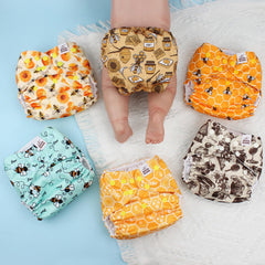 Mama Koala 3.0 pocket diaper hip snaps secure wings and prevent droop during active moments.