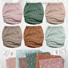 Mama Koala 3.0 diaper pocket open with inserts ready for quick changes.