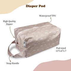 Mama Koala diaper pod Pine Forest, carry handle in use during travel