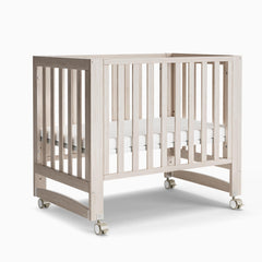 MAMAZING EvoNest 6in1 crib shown in nursery, highlighting versatile growth configurations