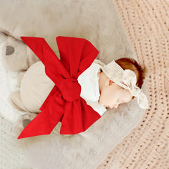Man Fai Sky bowknot detail on newborn swaddle sash adds visual charm
