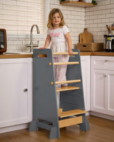 Mangohood toddler standing tower with closed design prevents leg entrapment during play and learning.