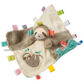 Mary Meyer Taggies Molasses Sloth blanket combo invites tactile exploration and comforting cuddles.