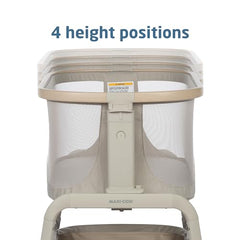 Maxi-Cosi Iora bedside bassinet storage basket keeps essentials within reach