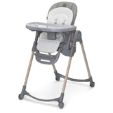 Maxi-Cosi Minla folded high chair green shows space-saving portability ideal for small kitchens.