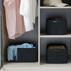 Maxuni cube storage basket in a nursery for soft toy and clothing storage.