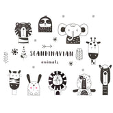 Maydahui Safari Wall Decals four sheets arranged on a wall to spark playful nursery vibes.