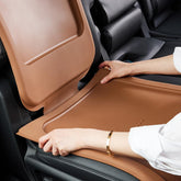 M Mayton Siliguard protector on brown leather seat prevents indentations.