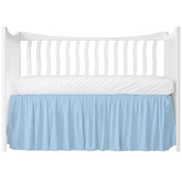 MD Home Decore crib skirt in light blue flatlay, showcasing soft cotton finish for nursery styling