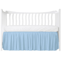 MD Home Decore crib skirt in light blue flatlay, showcasing soft cotton finish for nursery styling