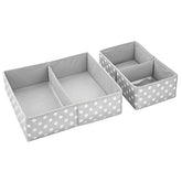 The mDesign fabric drawer organizer bin in gray polka dots keeps drawers tidy and contents visible.