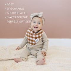 Mebie Baby muslin bib close-up stitching shows durable edges.