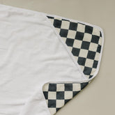 Mebie Baby muslin hooded towel charcoal checkered front view for cozy warmth