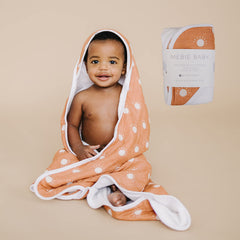 Mebie Baby muslin hooded towel sunshine image shows warm, cozy bath wrap for baby