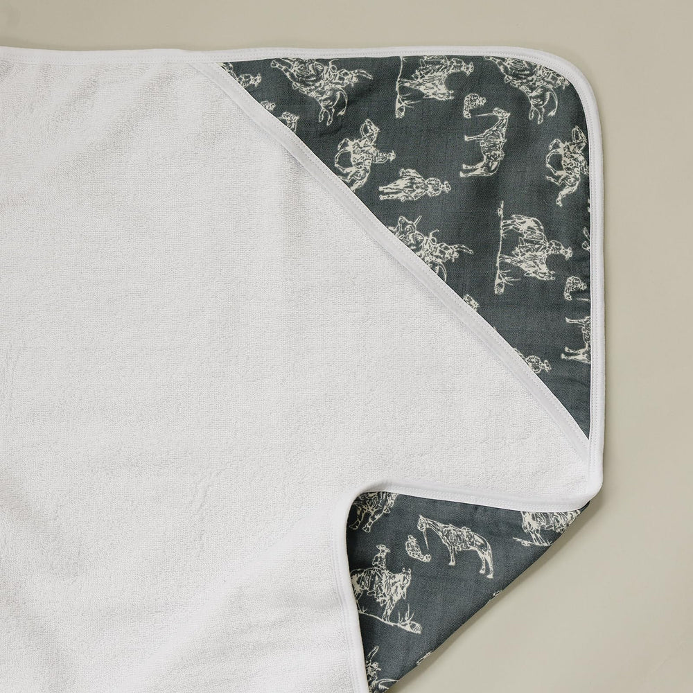 Mebie Baby muslin hooded towel with wild west pattern for warm, cozy bath time.