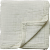 Mebie Baby muslin quilt cream folded, cozy sleep companion for babies
