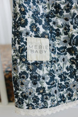 Mebie Baby Quilt Liberty Floral folded demonstrating easy storage and compact travel companion