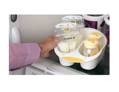 Medela storage tray keeping bottles organized in fridge or freezer