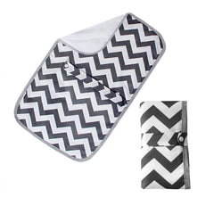 Medsuo foldable changing mat open in gray waves for quick on-the-go diaper changes.