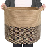 MEGASKET large wicker storage basket with blankets organized in the living room for cozy storage.