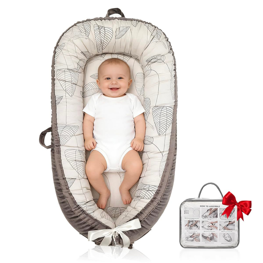 Meindoovm baby lounger Little Leaves reversible cover offers two cozy looks for daytime use
