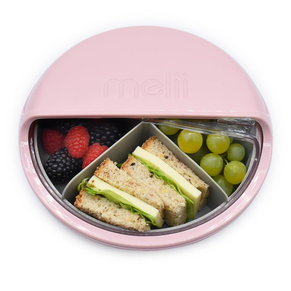melii Bento Spin pink lid demonstrates easy opening for kids and independent snack access.