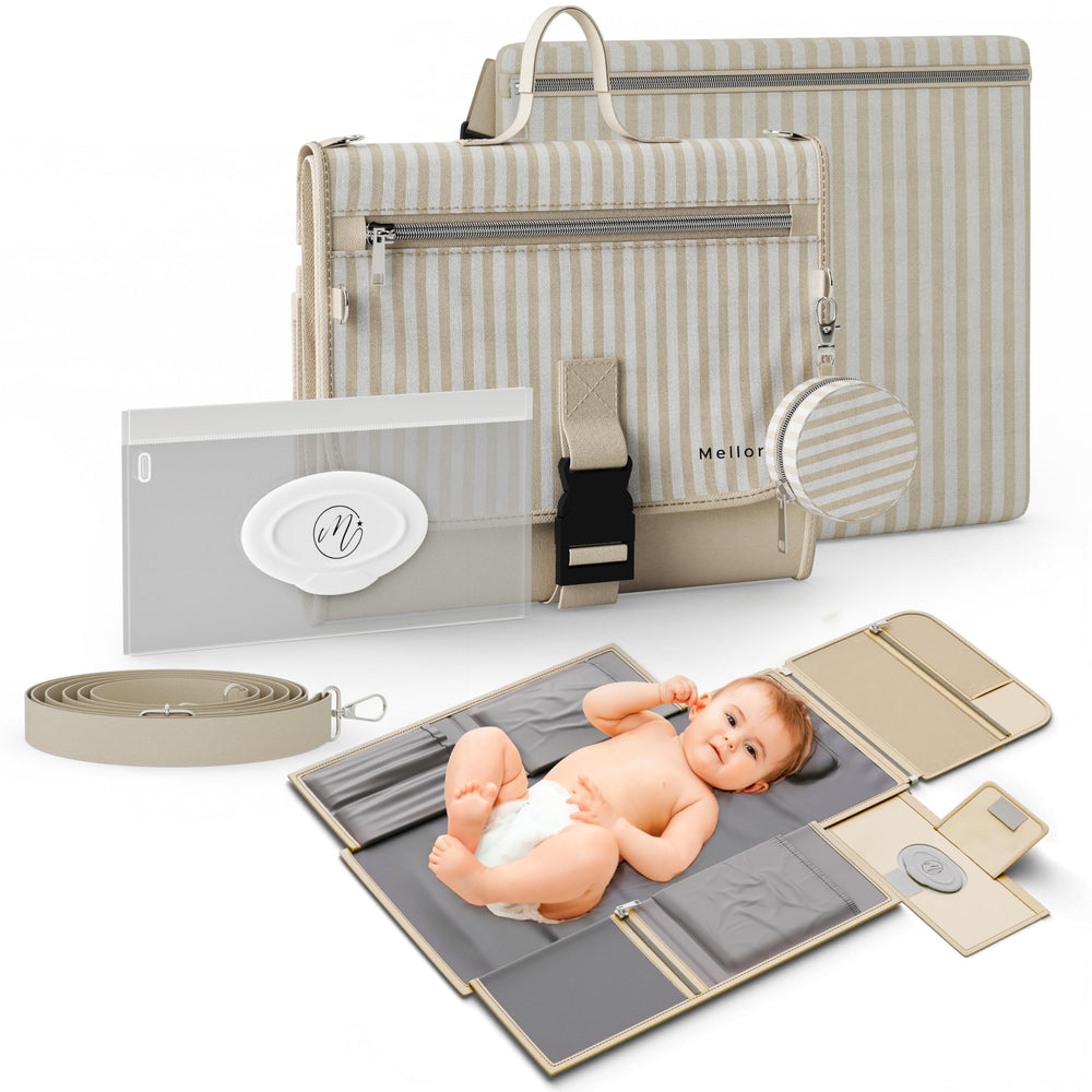 Mellories portable changing pad in beige striped opens flat for quick on-the-go diaper changes.