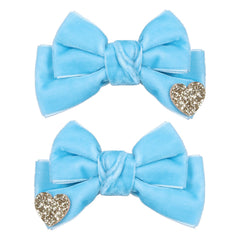 Melyde blue velvet hair bow with heart pattern for stylish everyday wear.