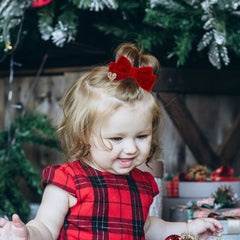 Melyde red velvet hair bow texture closeup highlighting luxe finish