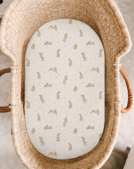 Meowcards bassinet sheet closeup highlights soft muslin fabric for gentle baby skin.
