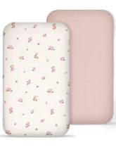 Meowcards muslin bedside sheets in Vintage Blossom pink pattern for a calming nursery.