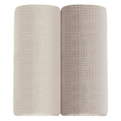 Meowcards muslin swaddle blanket closeup shows breathable double-layer fabric for cozy newborn snuggles.