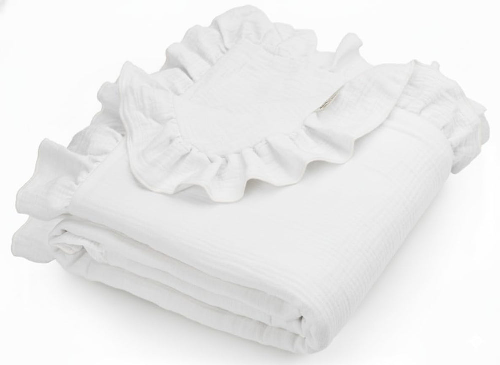 Meowcards Muslin Swaddle with ruffled edges for a stylish newborn photo shoot.