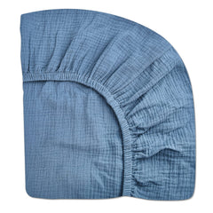 Meowcards pack n play sheet blue closeup highlighting soft muslin texture for gentle sleep.