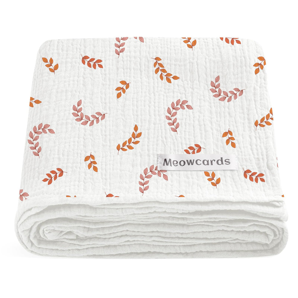 Meowcards swaddle blanket leaf fold demonstrates generous size for versatile newborn uses.