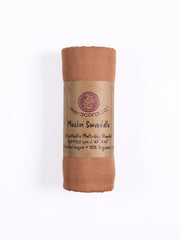 Meracorallo camel muslin swaddle blanket close-up highlights breathable bamboo-cotton blend