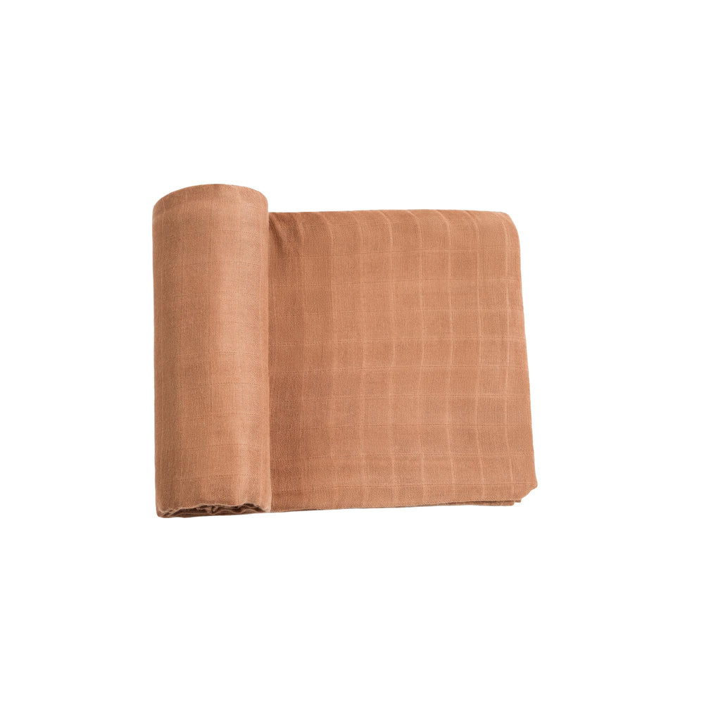 Meracorallo camel muslin swaddle blanket flatlay showing silky-soft fabric for baby comfort