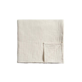 Meracorallo Muslin Swaddle Blanket close-up showing 100% cotton softness for gentle baby skin.