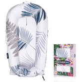 MEXXI infant lounger palm leaves cover offers breathable comfort.
