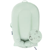 MEXXI organic replacement cover Pistacho Green on a DockATot Deluxe for breathable comfort